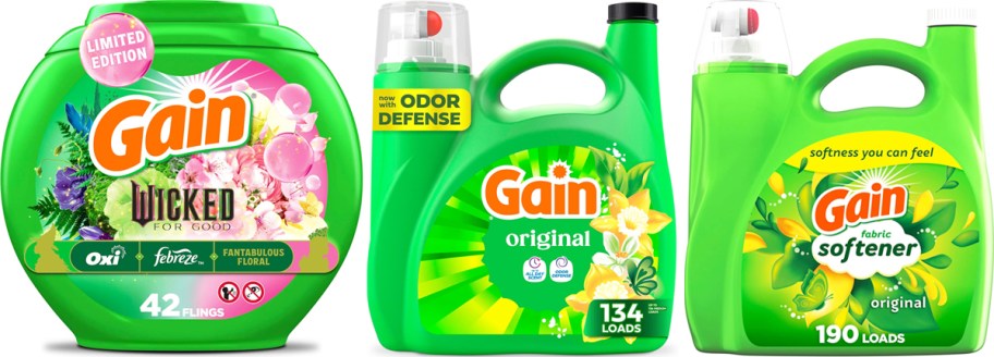 3 green bottles of gain laundry detergents