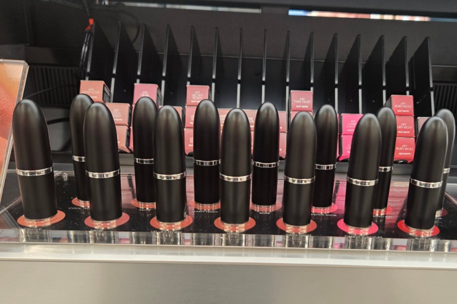 many lpsticks in black tubes