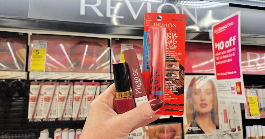Revlon cosmetics in a woman's hand