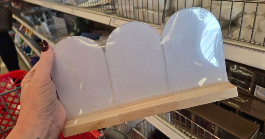 Hand holding a Clear Acrylic Signs 3-pack from Target's Bullseye's Playground