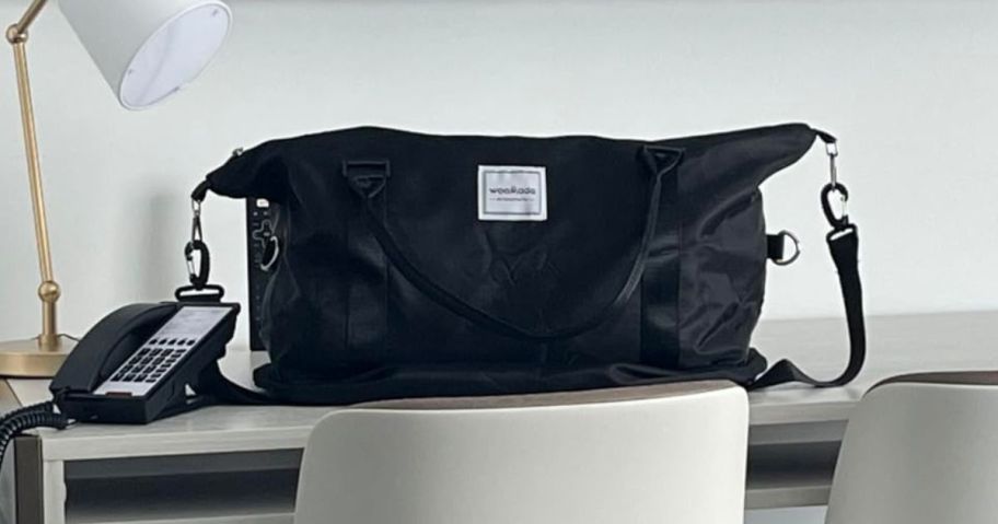 WOOMADA Weekender Carry-On Travel Bag on desk
