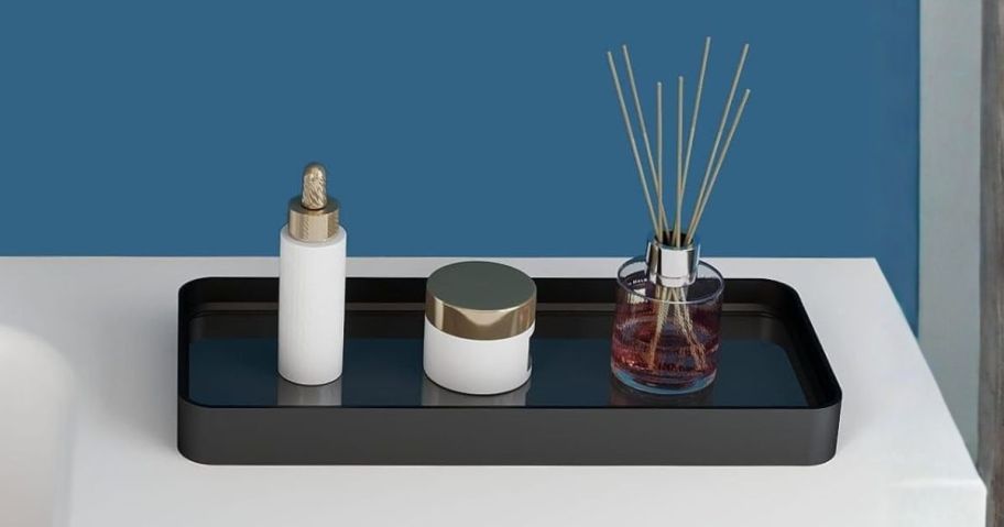 YUMORE Bathroom Countertop Organizer on counter with products in it