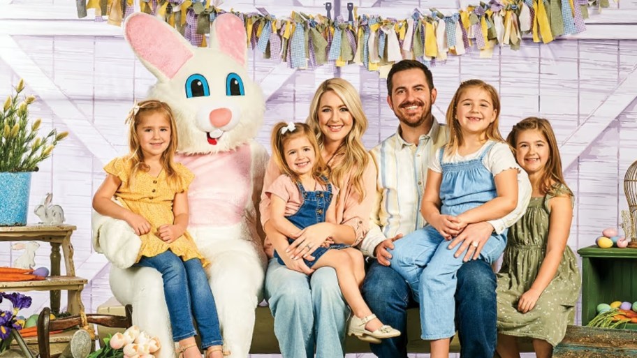 a family of 6 in a photo with the easter bunny