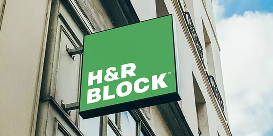 h&r block sign hanging on building 