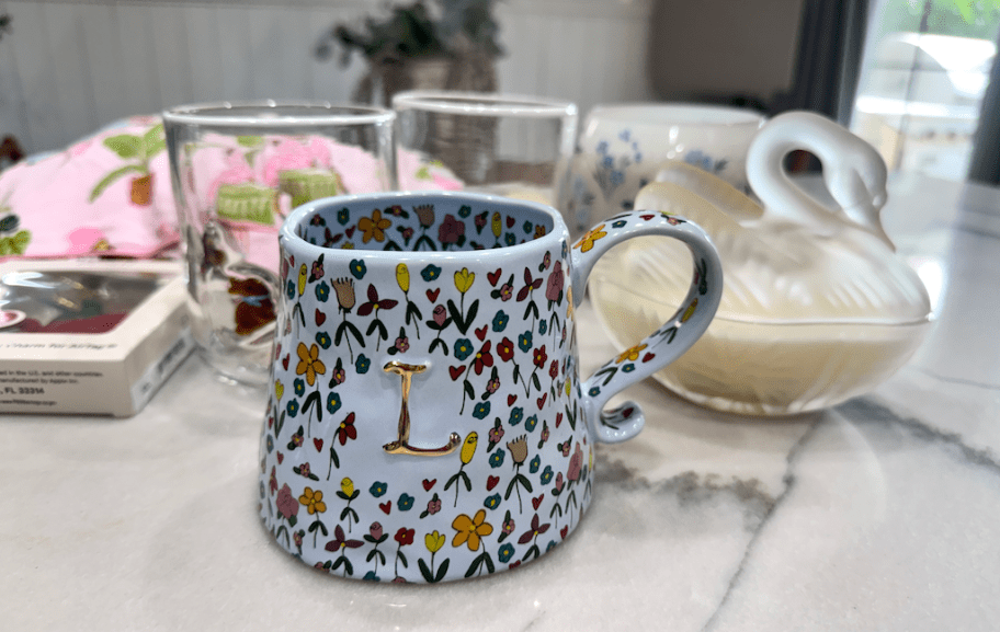 The Mud Fairy Stoneware Monogram Mug on counter