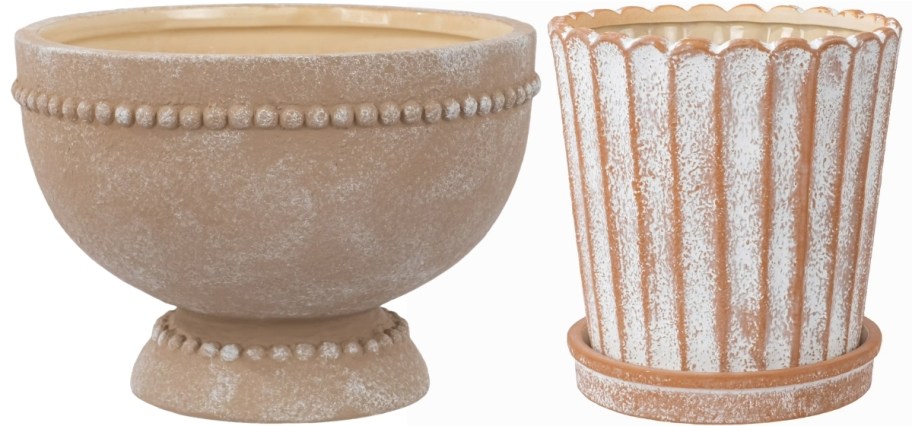 a round beaige planters shown with a round scalloped distressed planter