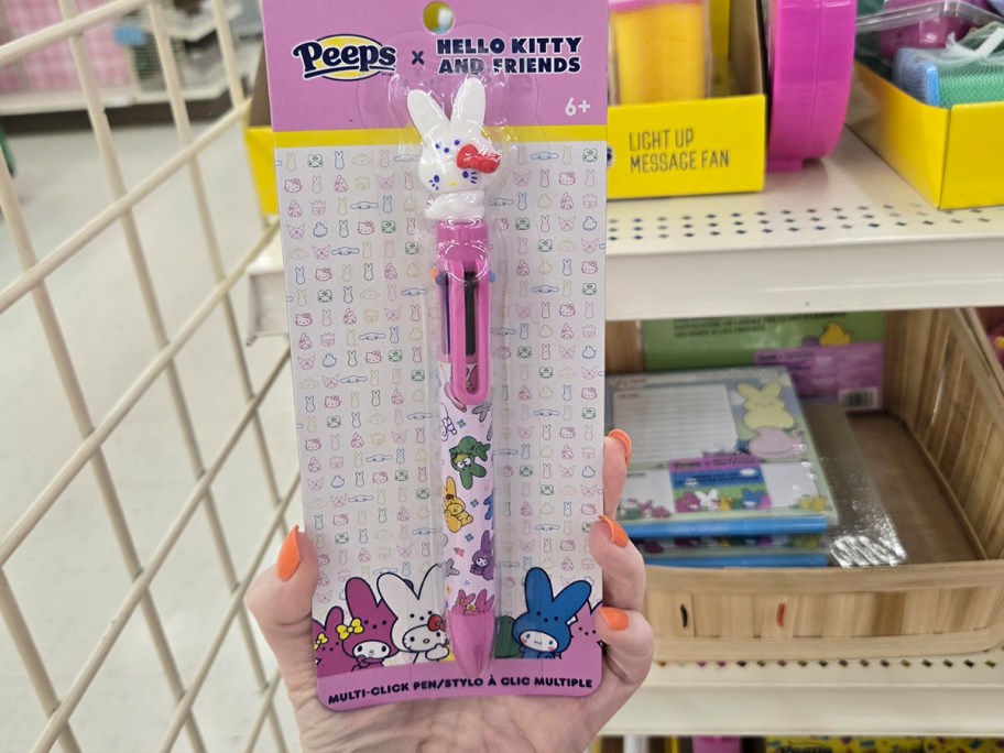 hand holding peeps pen 