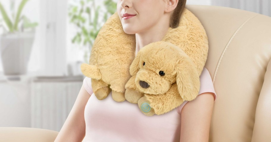 woman wearing a dog plush neck massager