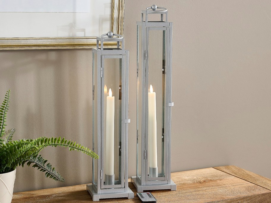 two silver lanterns 