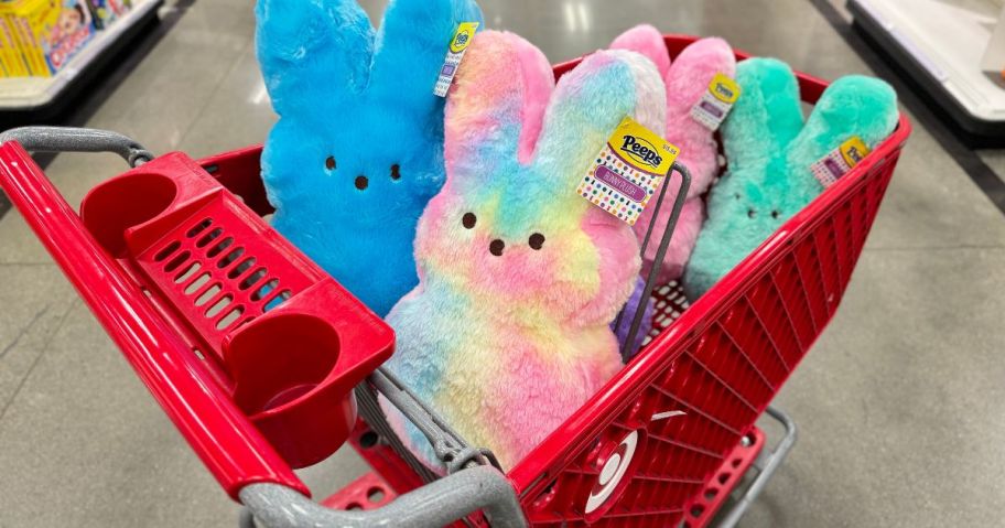 A target shopping cart filled with Peeps Plush