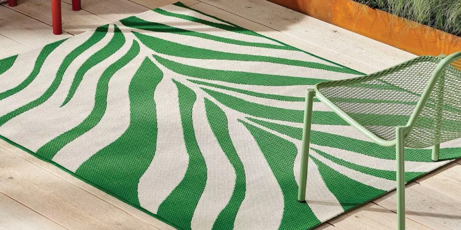 green and white leaf rug 