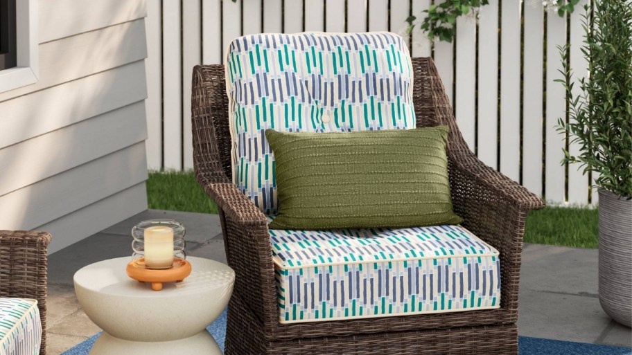 a two piece cushion set in a wicker club chair on a patio