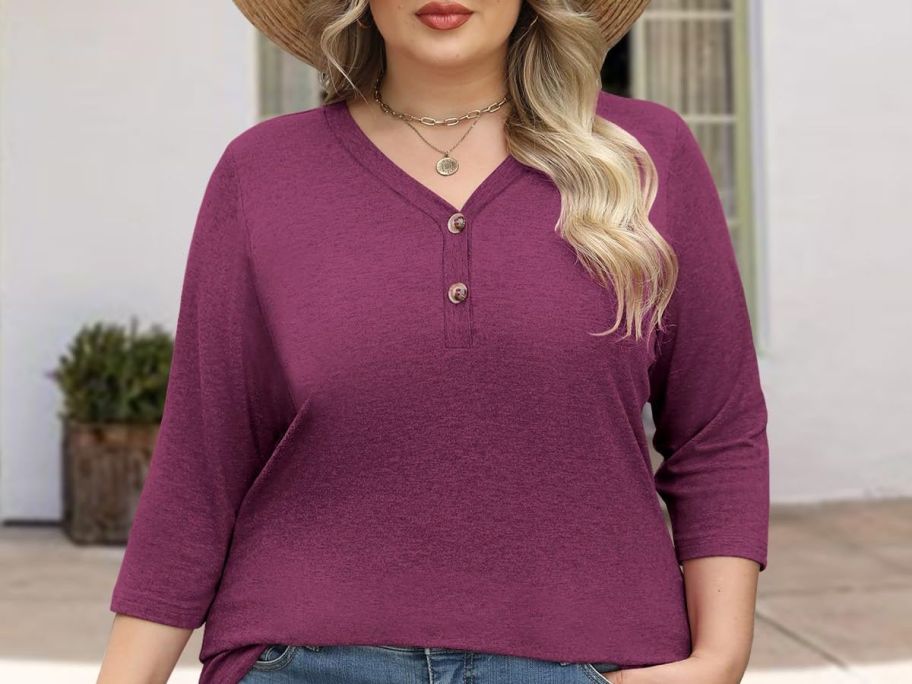 Woman wearing a 3/4 length shirt