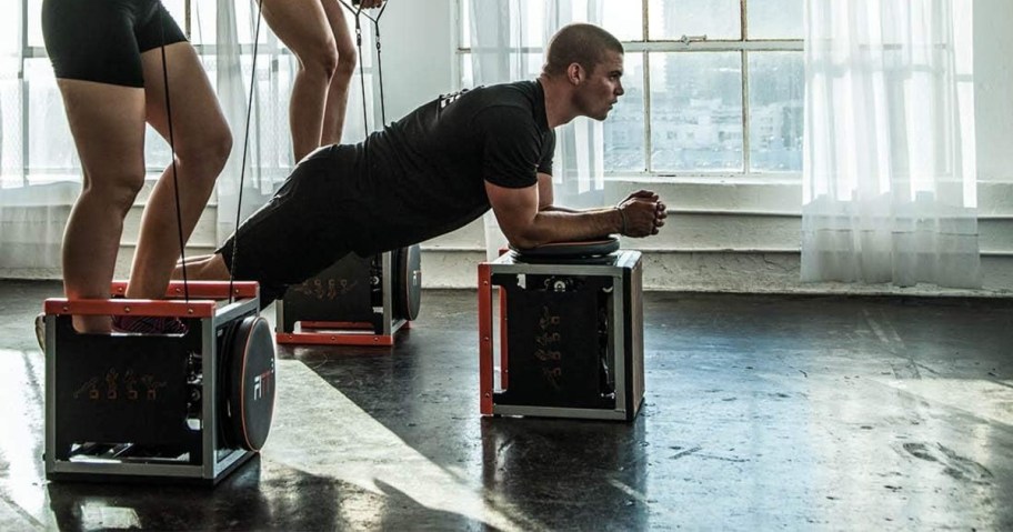 people working out using FITT cubes