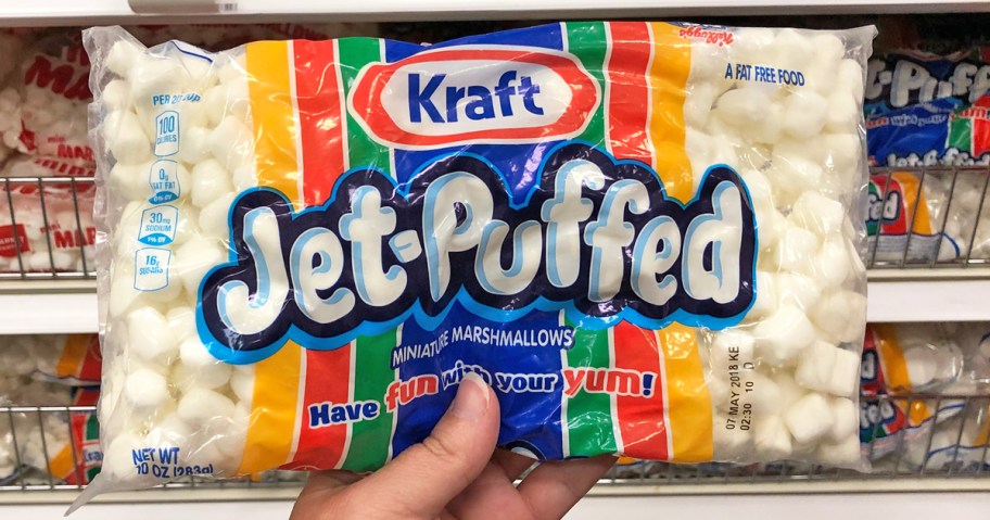 hand holding a bag of Jet-Puffed Mini Marshmallows in store