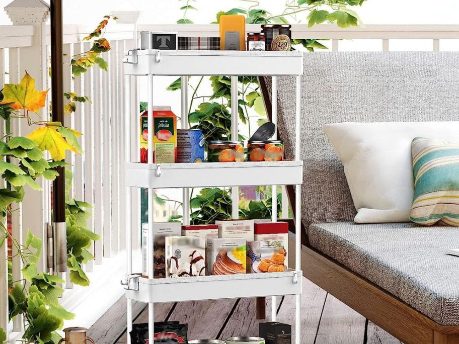 Rolling cart in white with items on it