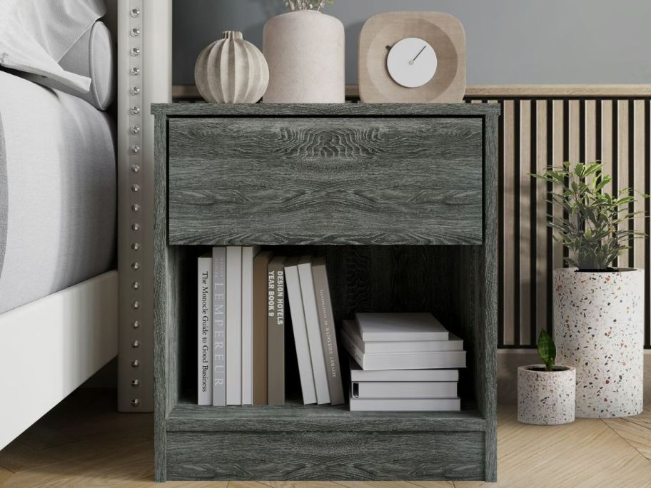 a gray one-drawer nightstand from Walmart