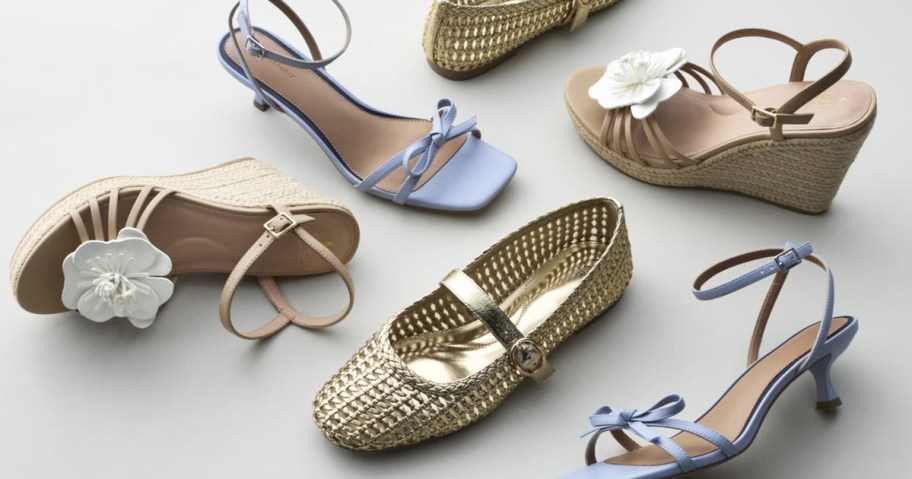 sandals, heels, and flats on a white floor