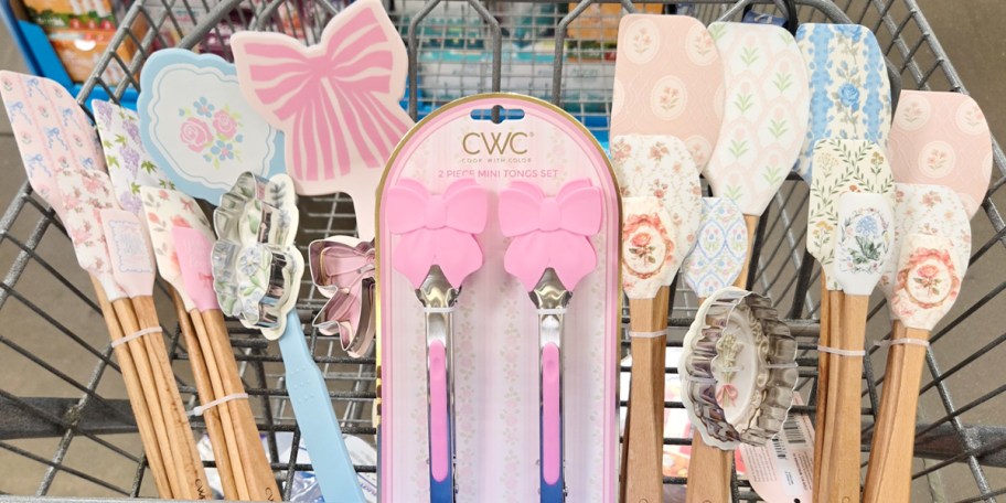 floral and bow pink and blue kitchen utensils in cart 