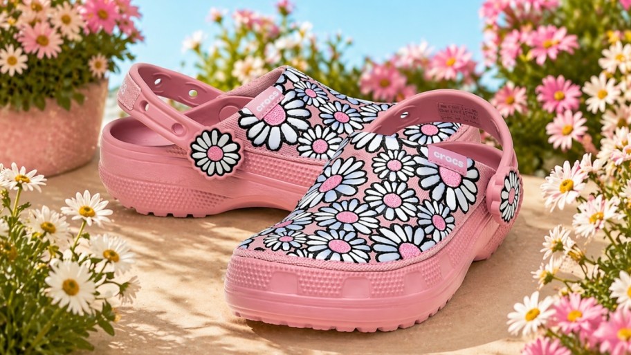 pair of crcos shoes in pink daisies
