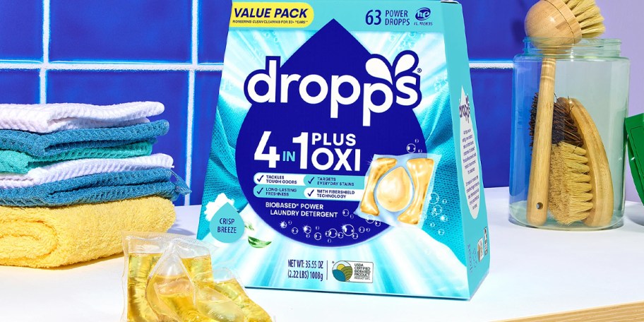 dropps laundry detergent box and pods on counter 