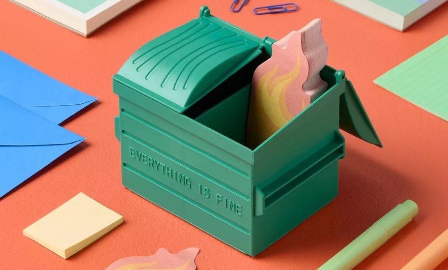 green dumpster with fire post it notes