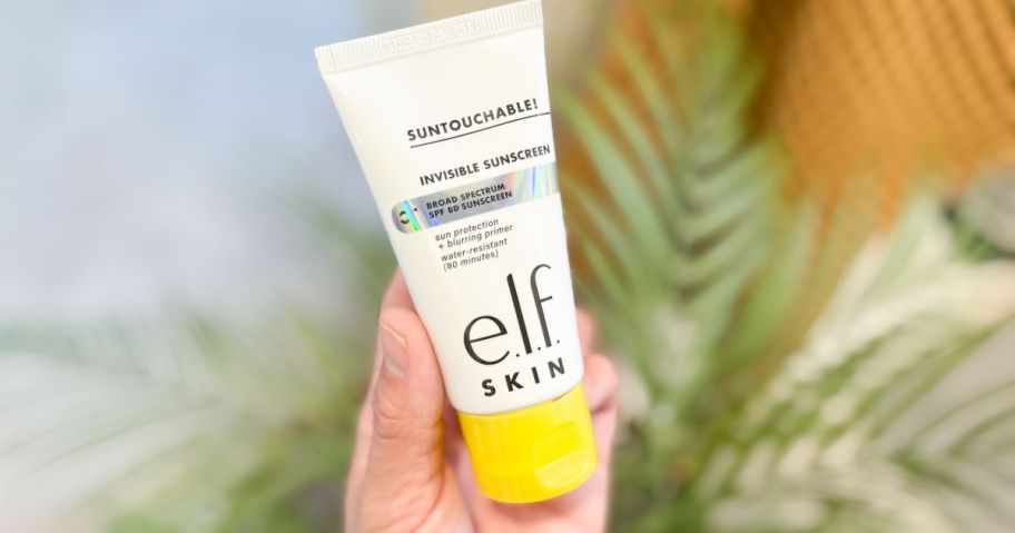 e.l.f. SKIN Suntouchable Invisible SPF 35 Sunscreen in hand