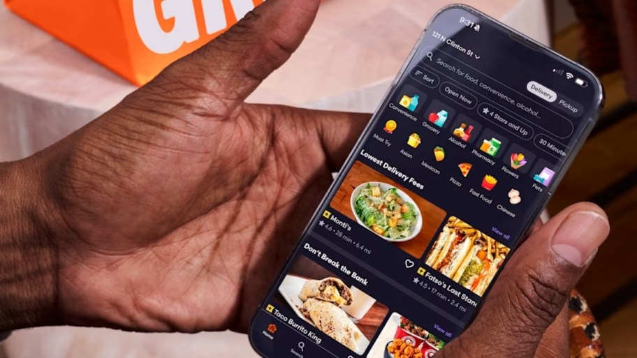 hand holding aphone with the grubhub app loaded 