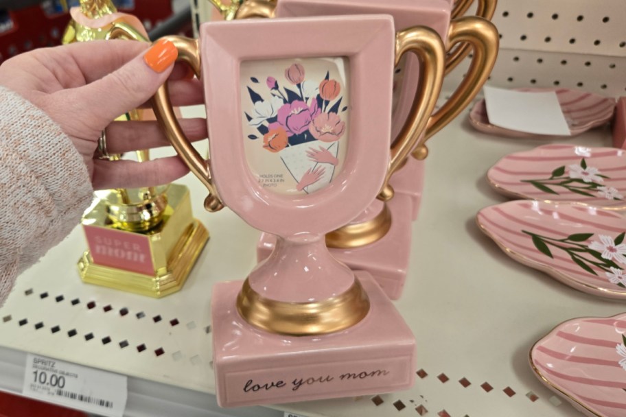 pink trophy shaped frame in store