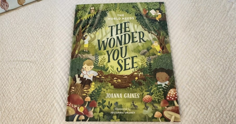 The World Needs the Wonder You See by Joanna Gaines hardcover book sitting on carpet