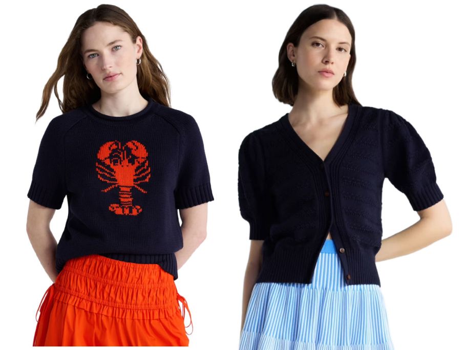 two women wearing navy sweaters on a white background